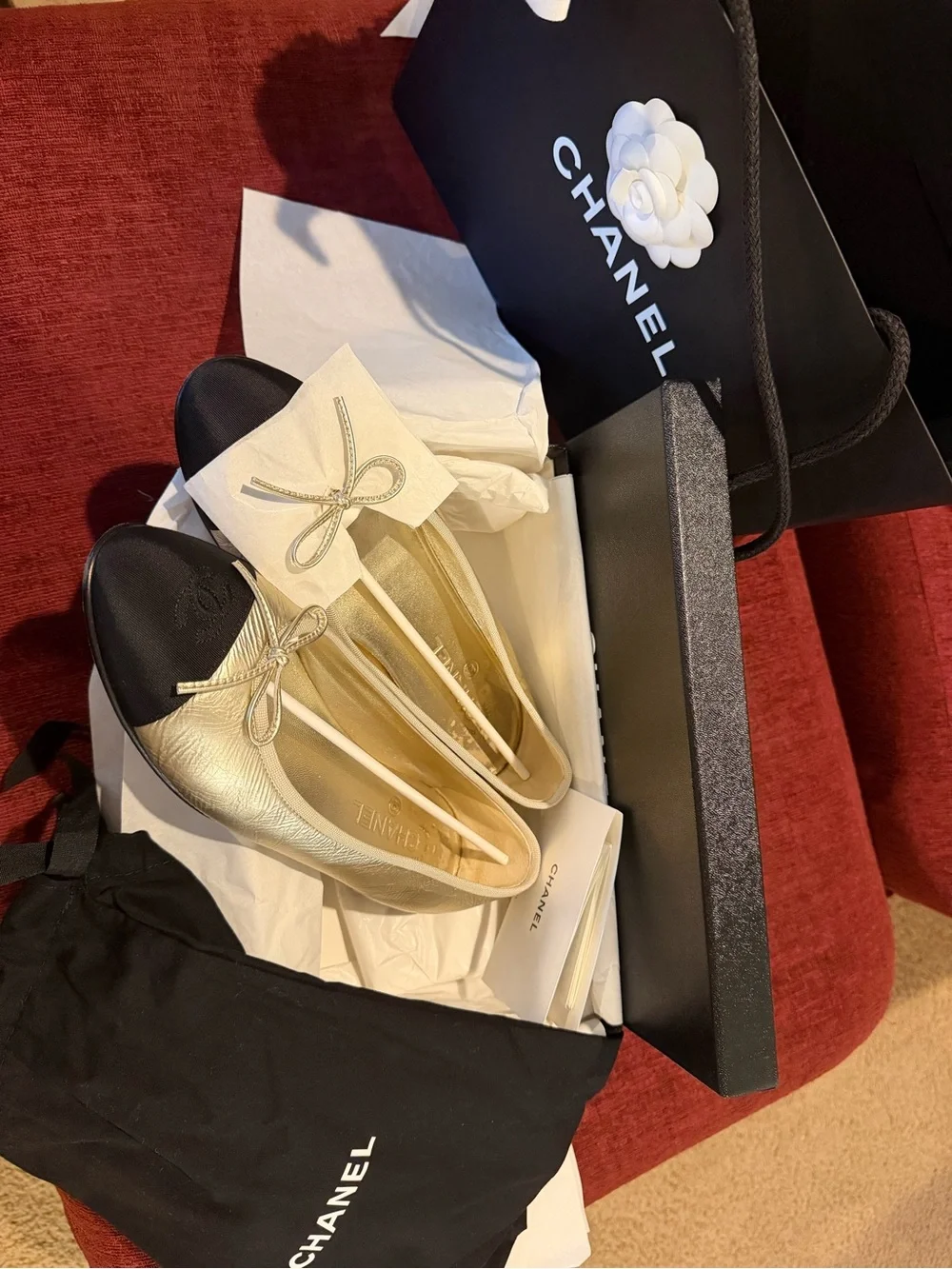 CHANEL Gold Leather Ballet Flats with Black Cap Toe Winter 2025 Season